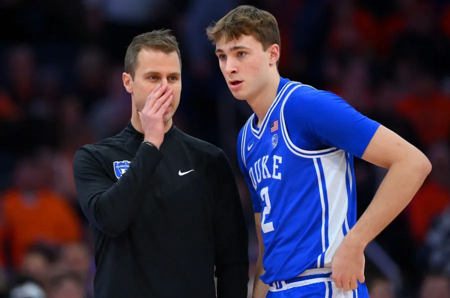 Feb 5, 2025; Syracuse, New York, USA; Duke Blue Devils head coach Jon Scheyer talks with guard Cooper Flagg (2) against the Syracuse Orange during the first half at the JMA Wireless Dome. Mandatory Credit: Rich Barnes-Imagn Images