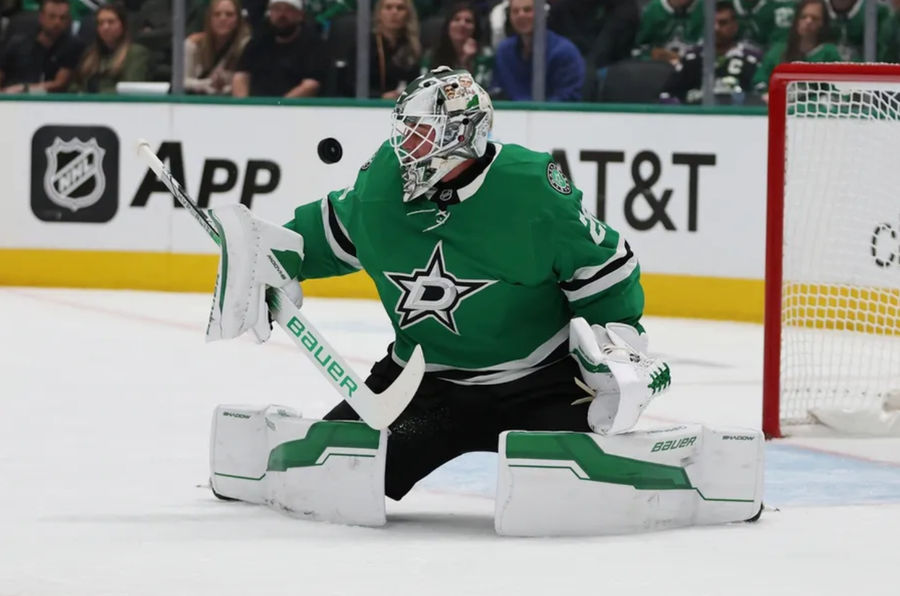 Oct 19, 2024; Dallas, Texas, USA; Dallas Stars goaltender Jake Oettinger (29) blocks a shot against the Edmonton Oilers in the first period at American Airlines Center. Mandatory Credit: Tim Heitman-Imagn Images