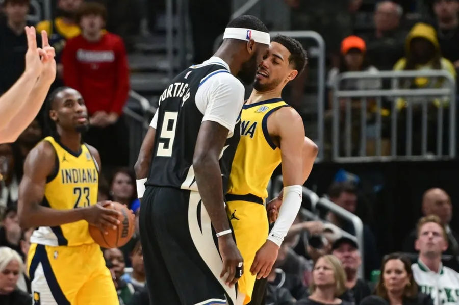 Apr 27, 2025; Milwaukee, Wisconsin, USA; Milwaukee Bucks forward Bobby Portis (9) head butt Indiana Pacers guard Tyrese Haliburton (0) in the second quarter during game four of first round for the 2024 NBA Playoffs at Fiserv Forum. Mandatory Credit: Benny Sieu-Imagn Images