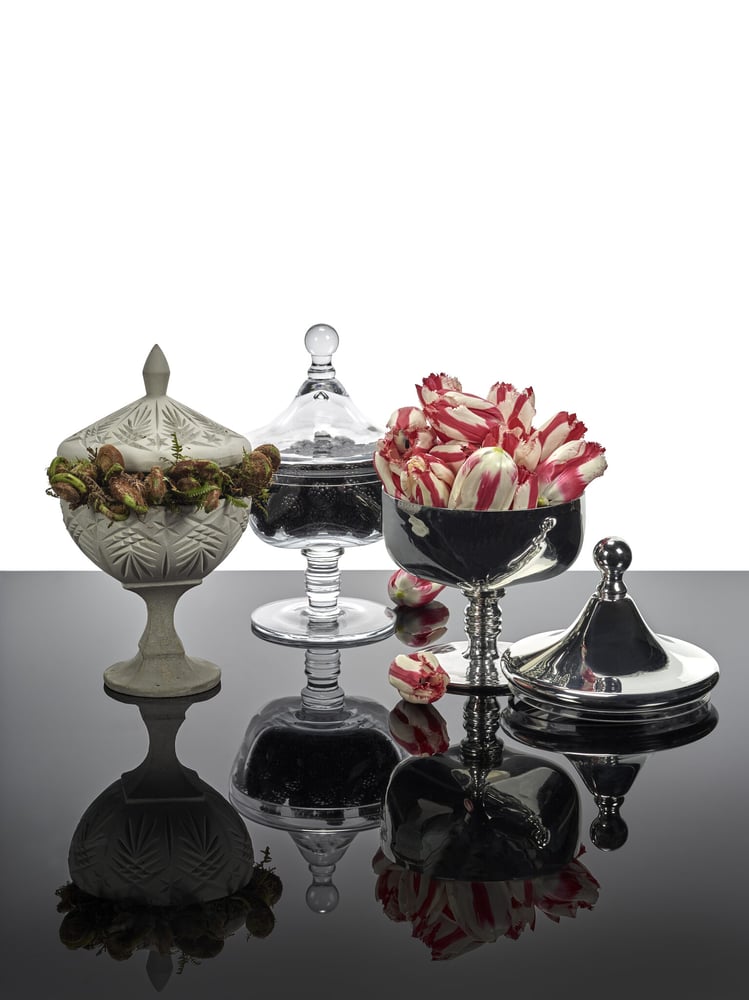 Candy boxes from The Josephine Collection feature concrete, glass and polished silver finishes.
