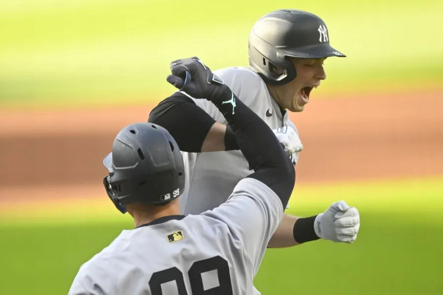 Apr 22, 2025; Cleveland, Ohio, USA; New York Yankees designated hitter Ben Rice (22) celebrates his solo home run with right fielder Aaron Judge (99) in the first inning against the Cleveland Guardians at Progressive Field. Mandatory Credit: David Richard-Imagn Images