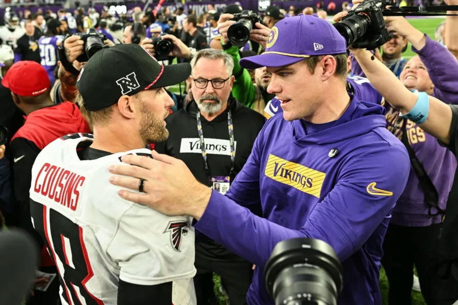 Dec 8, 2024; Minneapolis, Minnesota, USA; Atlanta Falcons quarterback Kirk Cousins (18) and Minnesota Vikings head coach Kevin O'Connell talk after the game at U.S. Bank Stadium. Mandatory Credit: Jeffrey Becker-Imagn Images