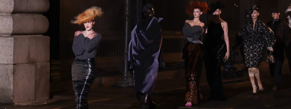 A look from Maison Margiela’s Spring 2024 Artisanal couture show by John Galliano, staged beneath the Pont Alexandre III in Paris.