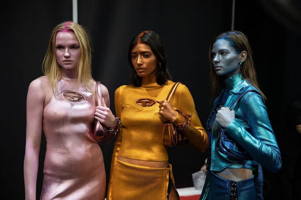 A backstage moment at Diesel’s Fall/Winter 2022 show designed by Glenn Martens.