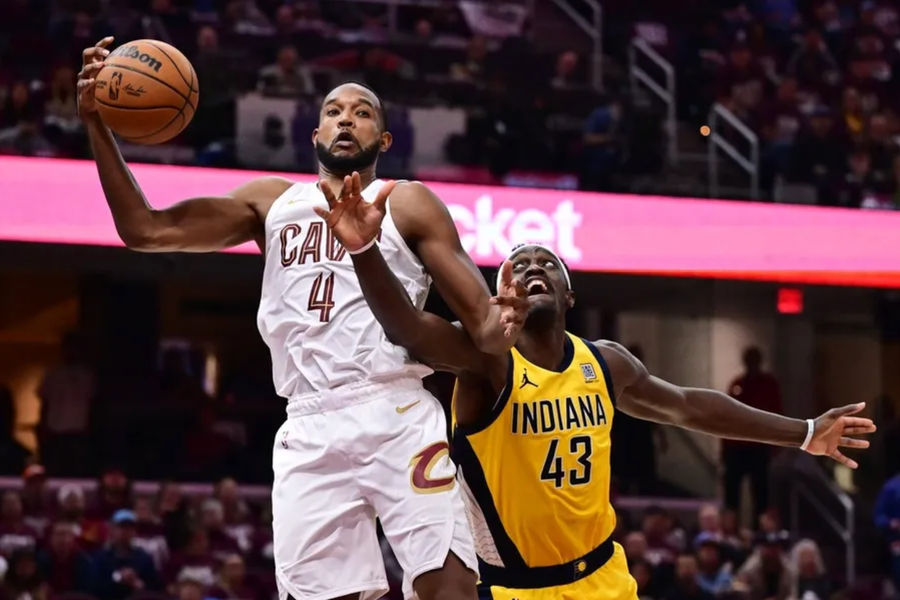 May 4, 2025; Cleveland, Ohio, USA; Cleveland Cavaliers forward Evan Mobley (4) goes for a rebound against Indiana Pacers forward Pascal Siakam (43) during the second half in game one of the second round for the 2025 NBA Playoffs at Rocket Arena. Mandatory Credit: Ken Blaze-Imagn Images
