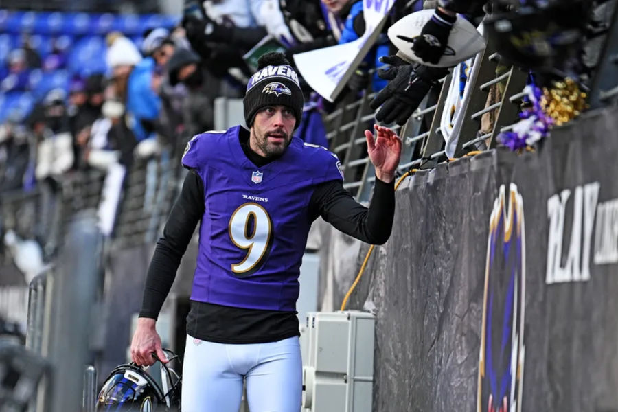 Jan 4, 2025; Baltimore, Maryland, USA; Baltimore Ravens place kicker Justin Tucker (9) arrives before the game against the Cleveland Browns at M&T Bank Stadium. Mandatory Credit: Tommy Gilligan-Imagn Images