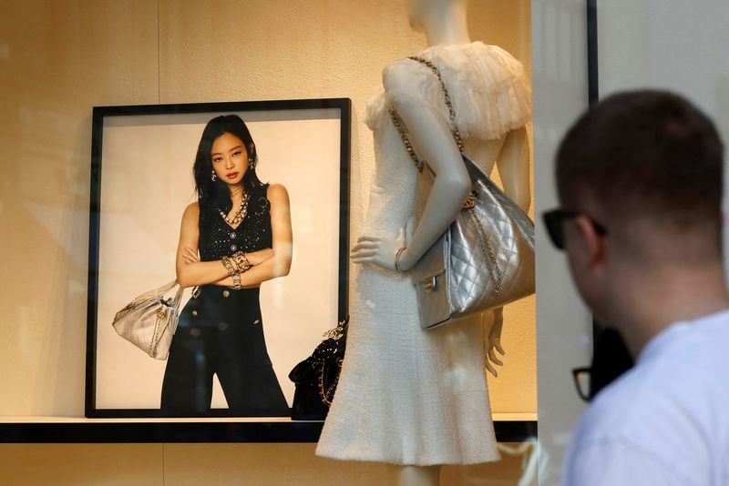 Chanel pushes growth with 48 new stores amid market slowdown.