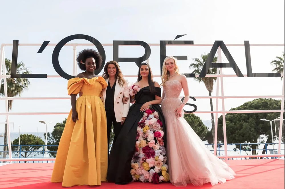 Viola Davis, Delphine Viguier-Hovasse, Aishwarya Rai, and Elle Fanning — ambassadors of L’Oréal Paris — pose at the Cannes film festival in May 2022.