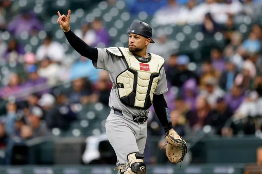 May 25, 2025; Denver, Colorado, USA; New York Yankees catcher J.C. Escarra (25) gestures in the sixth inning against the Colorado Rockies at Coors Field. Mandatory Credit: Isaiah J. Downing-Imagn Images