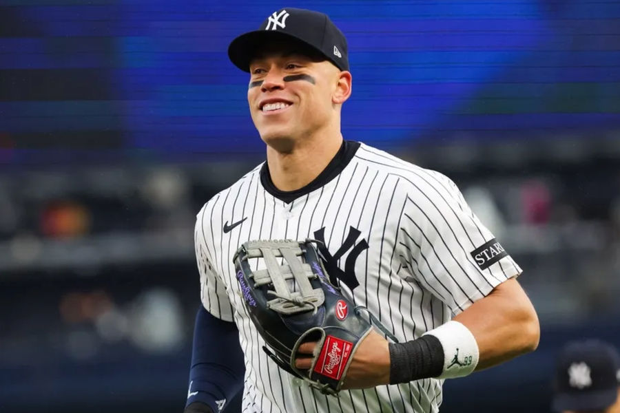 Apr 12, 2025; Bronx, New York, USA; New York Yankees outfielder Aaron Judge (99) reacts after catching a pop fly against the San Francisco Giants during the eighth inning at Yankee Stadium. Mandatory Credit: Tom Horak-Imagn Images