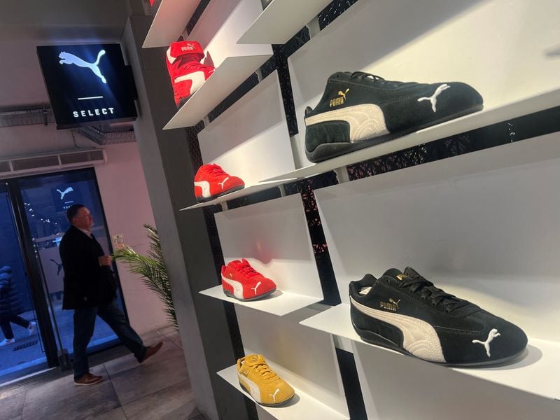 Puma's profit down 99% in the year to March.