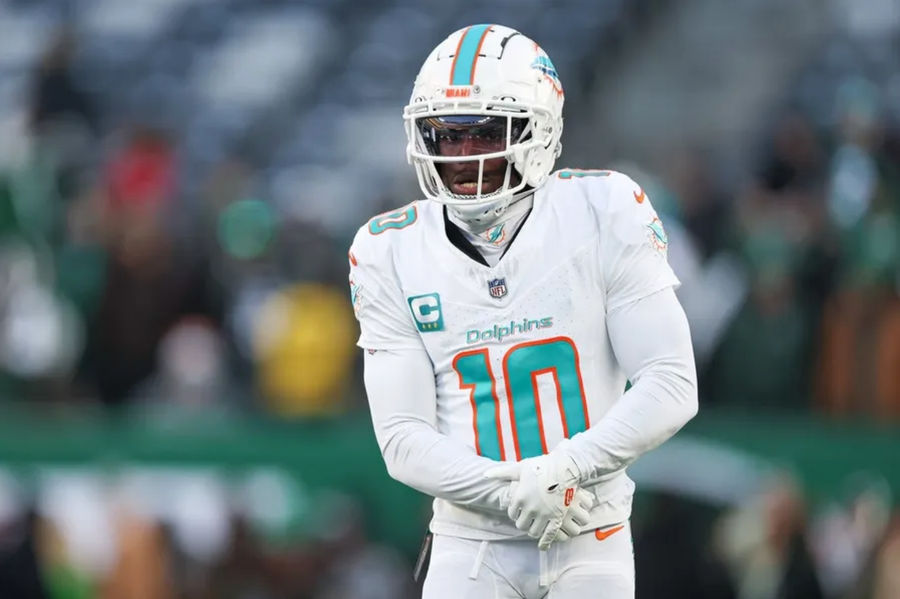 Jan 5, 2025; East Rutherford, New Jersey, USA; Miami Dolphins wide receiver Tyreek Hill (10) on the field before the game against the New York Jets at MetLife Stadium. Mandatory Credit: Vincent Carchietta-Imagn Images