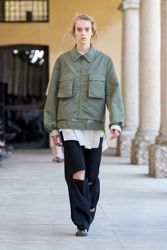 Qasimi Spring/Summer 2026: A utilitarian look shown in the cloisters of Sant’Eustachio, part of a reflective 10th anniversary collection under Hoor Al-Qasimi.