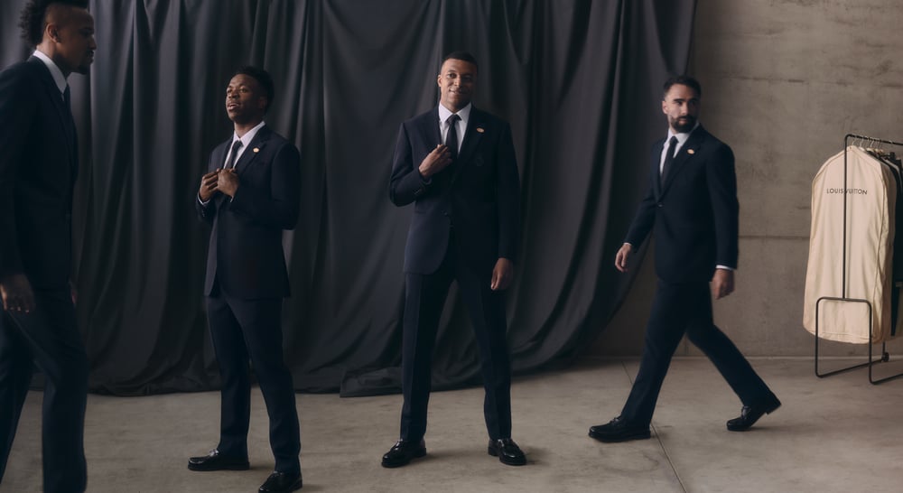 Real Madrid players wearing Louis Vuitton ready-to-wear from the formal wardrobe collection.