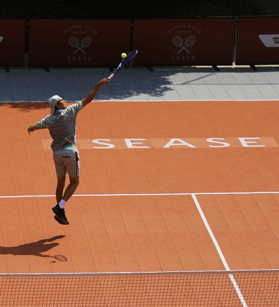 Sease debuts the Tennis Kit capsule by transforming the courtyard of Portrait Milano into a full-sized urban tennis court during Milan Fashion Week.