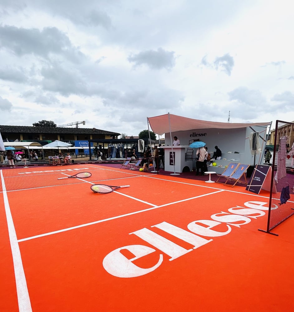 ellesse’s stand at the Pitti Uomo show emphatically illustrates the brand’s connection to tennis