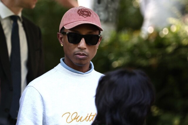 Pharrell teases ‘future staple’ denim at Paris men's fashion week.