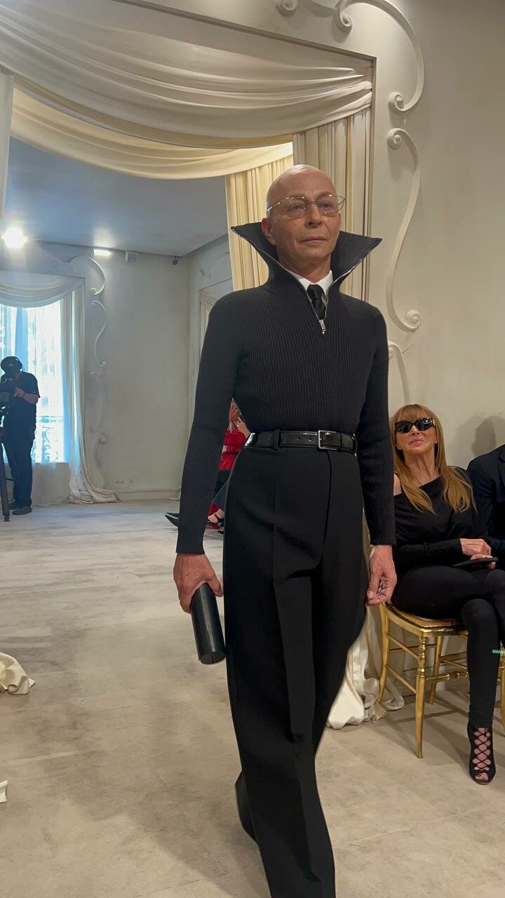 High-collared tailoring recalls Medici and Nosferatu influences in Demna’s structured, minimalist silhouettes.