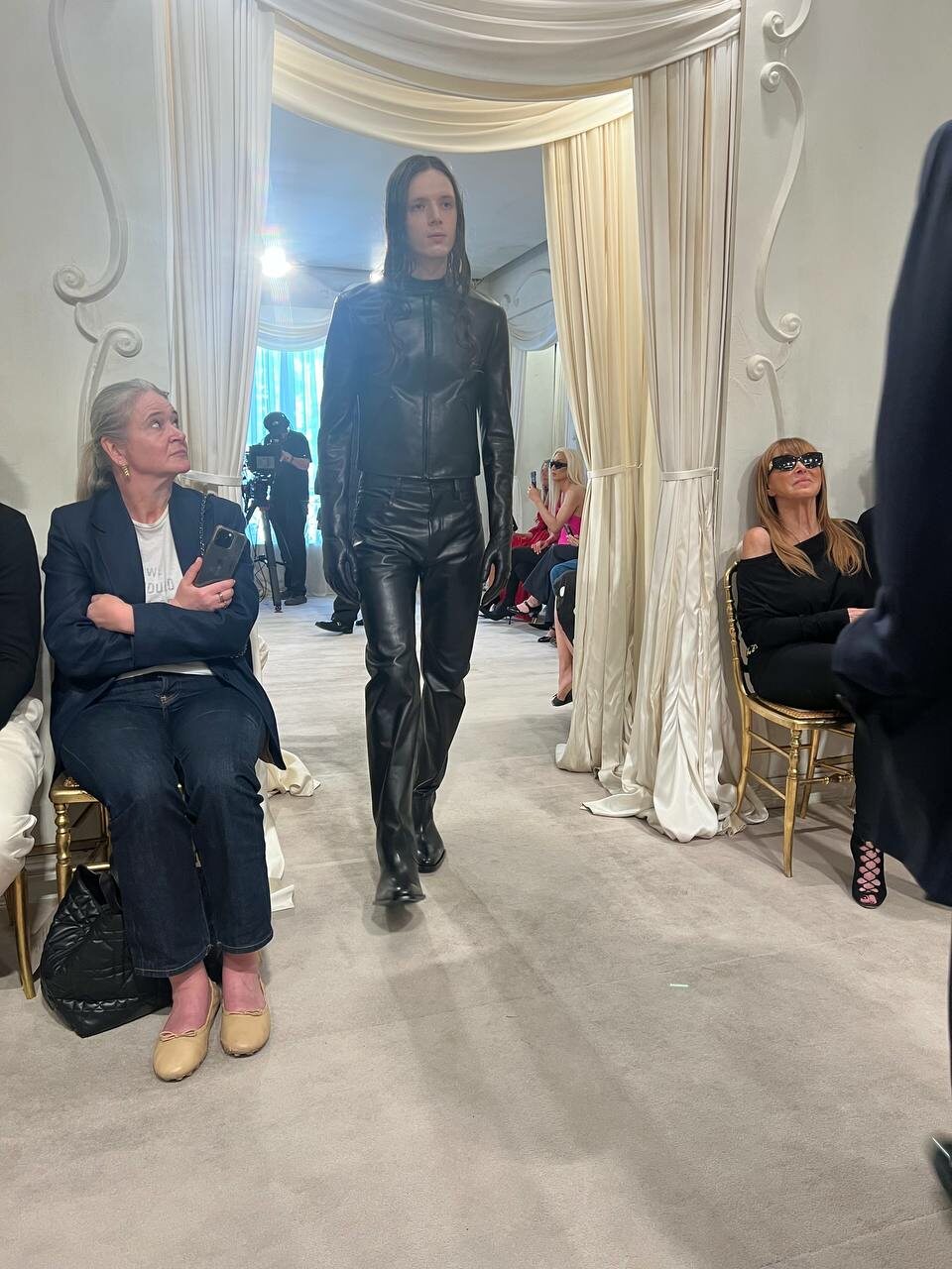 A sleek leather ensemble highlights Demna’s structured reinterpretation of masculine tailoring.